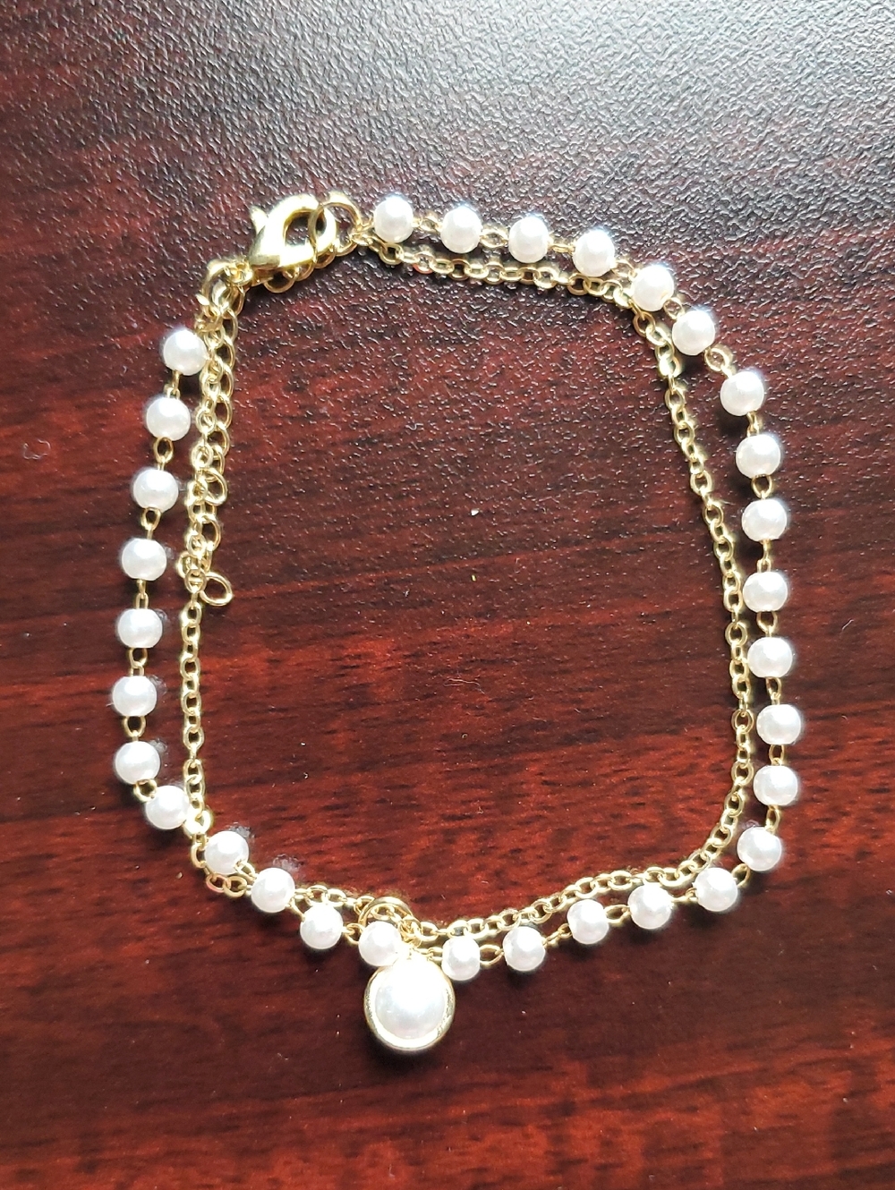 Gold-Plated Double Chain Bracelet with White Pearls and Pearl Charm